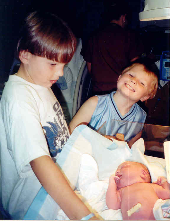 proud Big brothers moments after birth